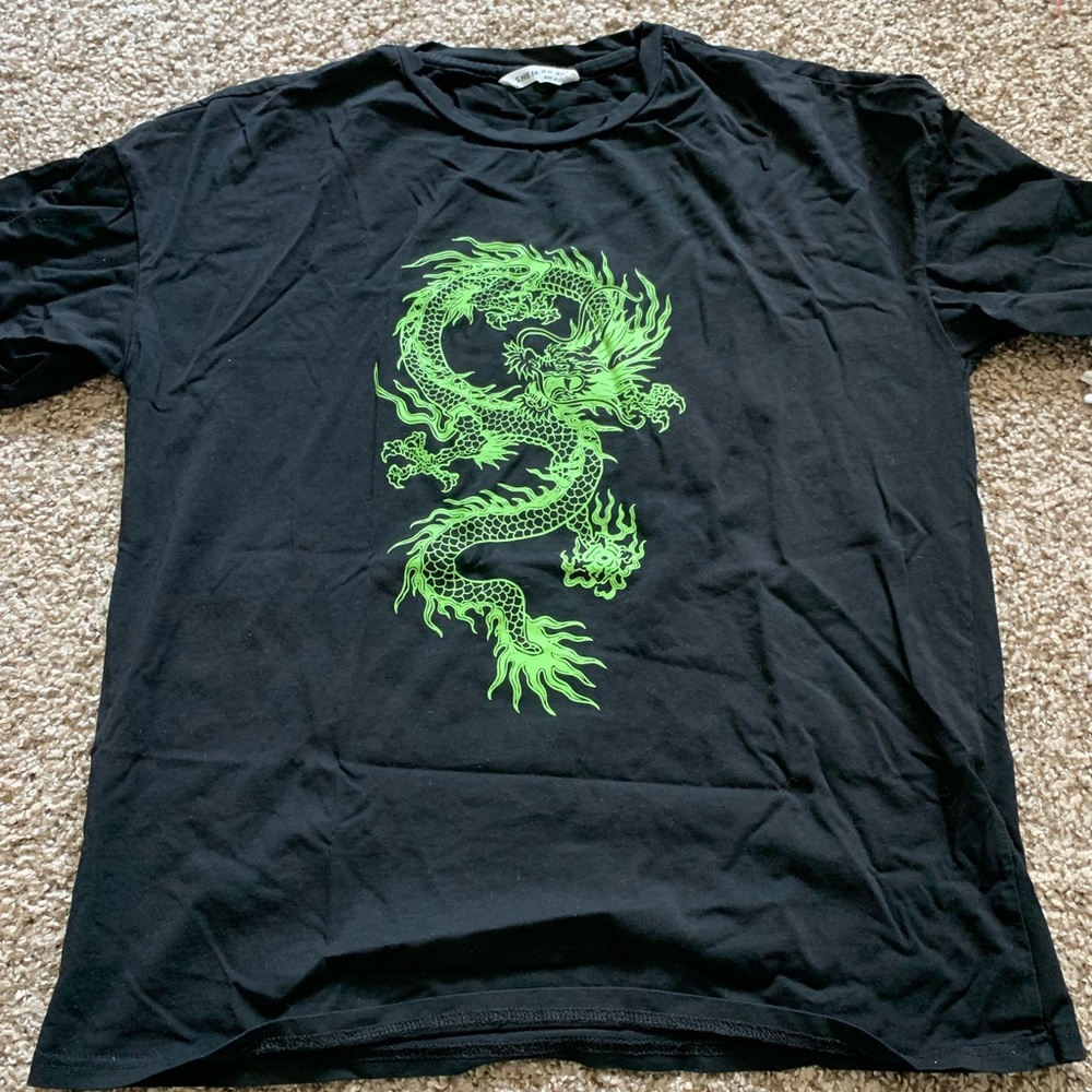 This shirt is from Shein and it’s green and black but it does have a tiny hole